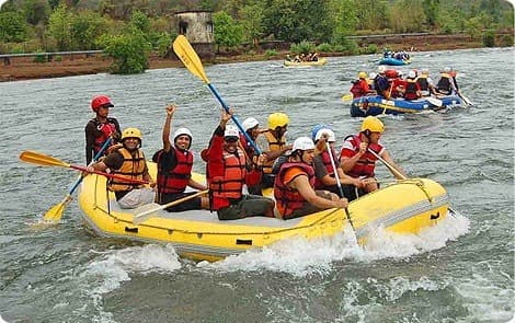 Rafters navigating white-water rapids at the Kali-Gori confluence, Jauljibi